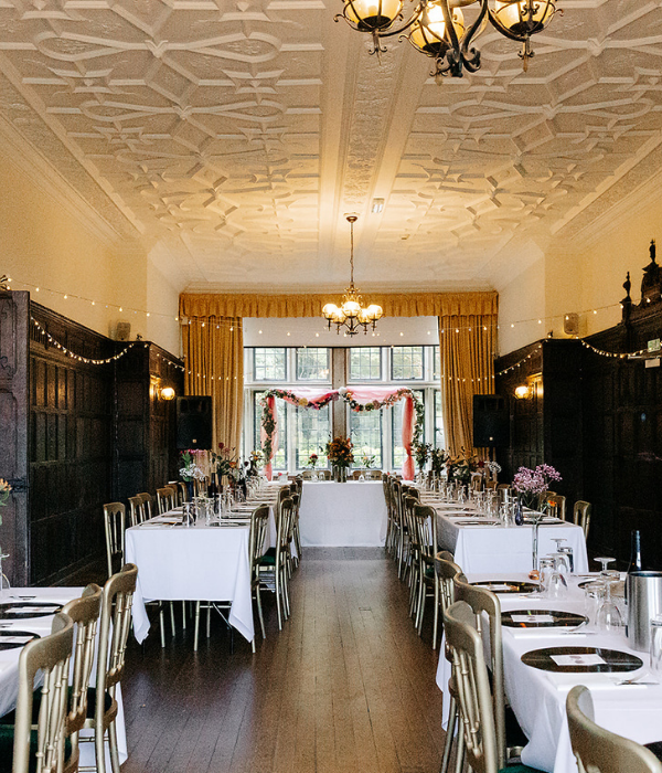 Bride sitting in a large bay window